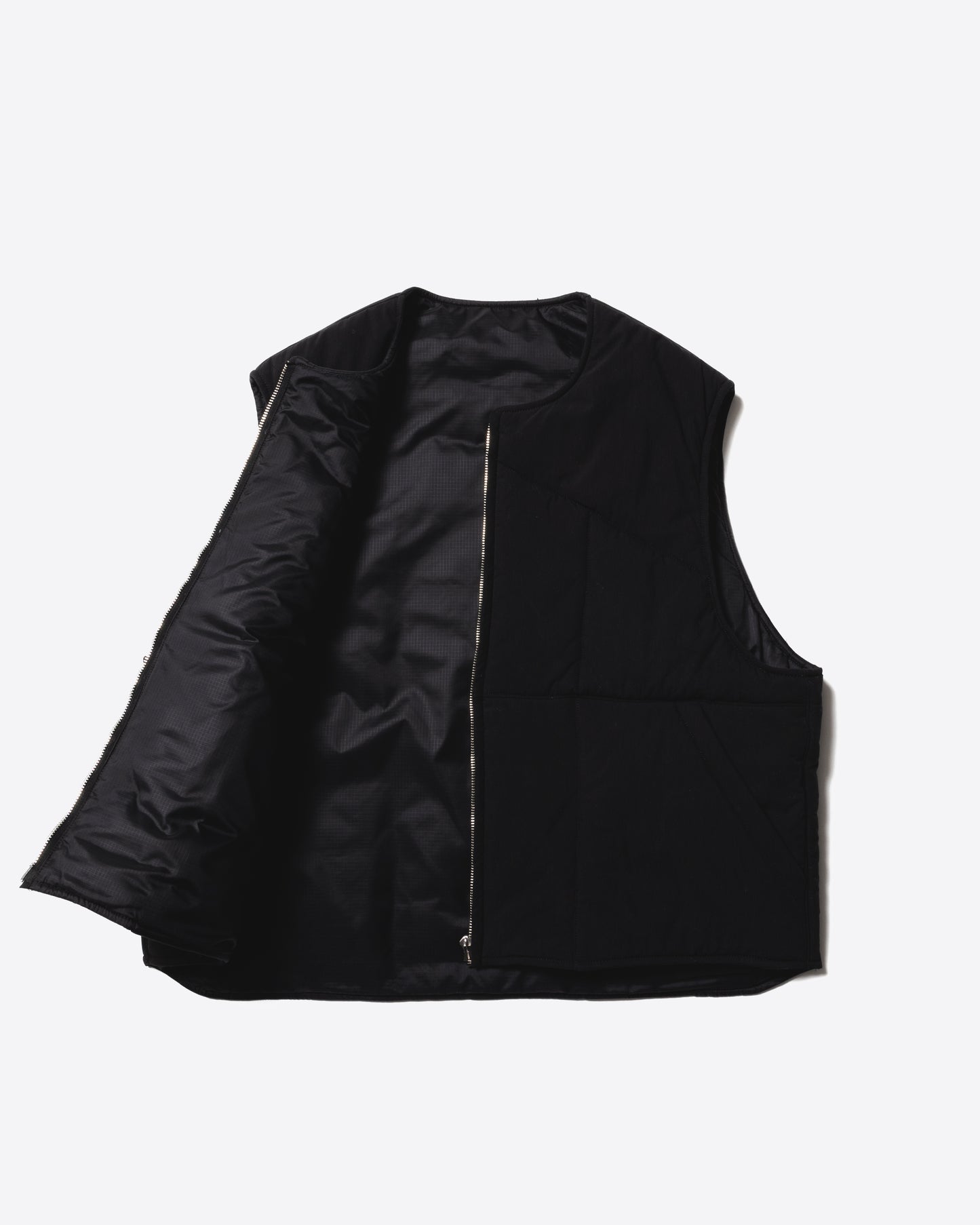 Unlikely Reversible Utility Vest