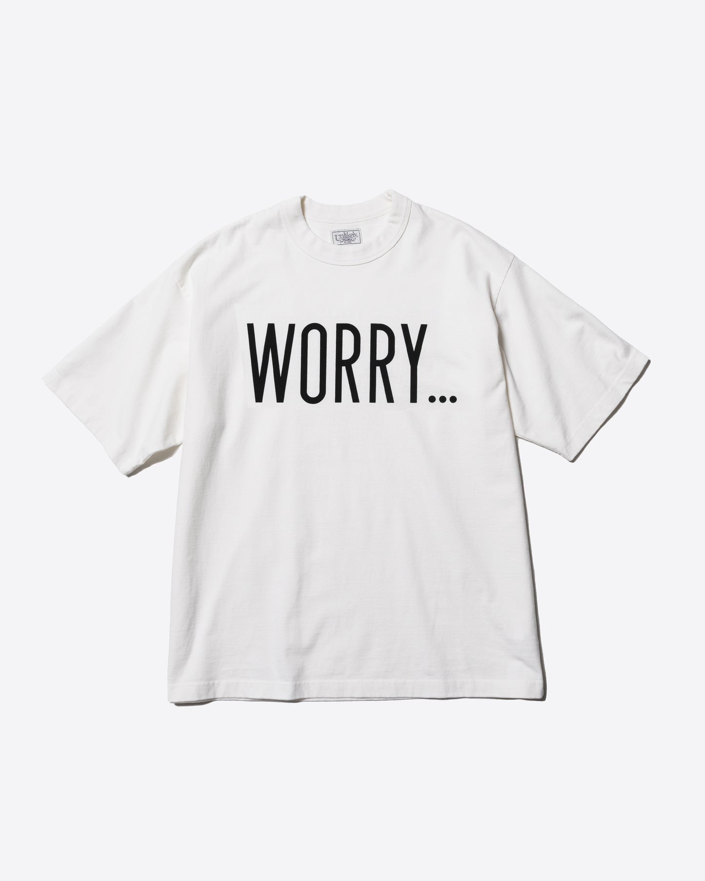 Unlikely Authentic Graphic Tee "WORRY..."